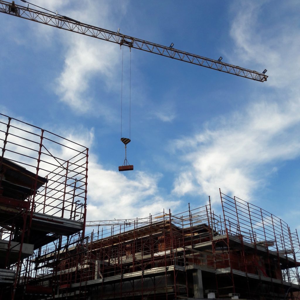 Closeup of a tower cranes used in heavy construction